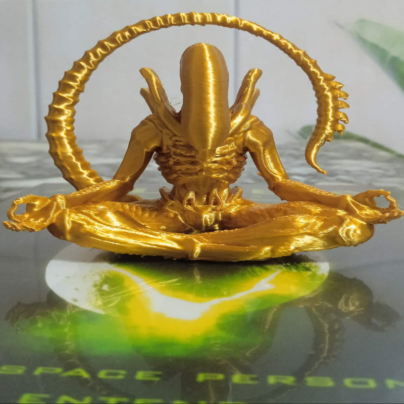 Figurine Alien doré